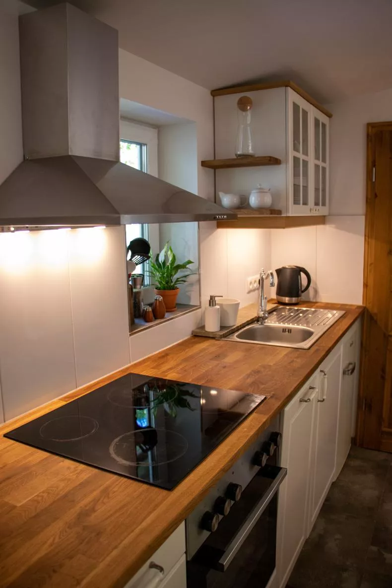 Kitchen with ceramic hob and oven