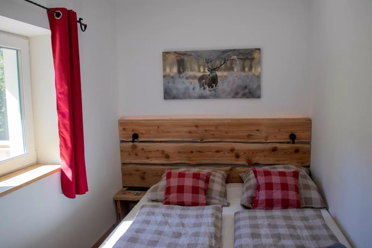 Main bedroom with alpine artwork